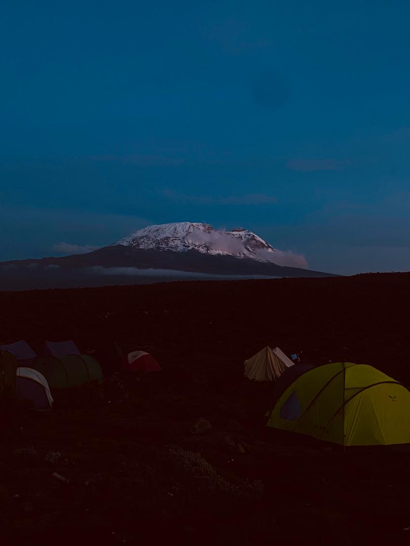 Night view of Kilimanjaro above high camp tents
